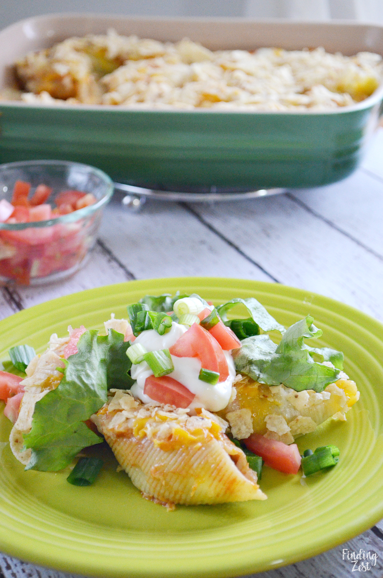 These taco stuffed shells are the answer to your dinnertime woes! Surprise family or guests with this unique take on stuffed shells by making stuffed taco pasta shells. This recipe will become a new family favorite!