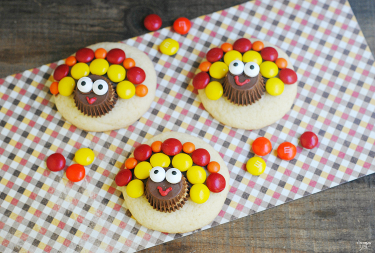 Check out these adorable turkey sugar cookies for Thanksgiving featuring peanut butter cups and chocolate candies. This is a perfect activity for kids and a great way to use leftover Halloween candy!!