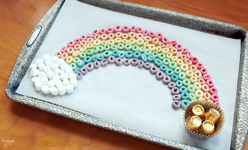 Learn how to make this fun edible rainbow with this spring craft! Perfect rainy day or St. Patrick's Day kids activity!
