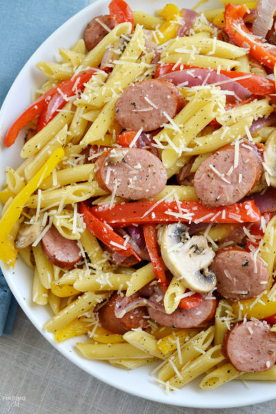 Need a quick dinner recipe? Try this smoked sausage penne pasta recipe that can be on your table in under 30 minutes! Loaded with fresh sauteed vegetables and Parmesan cheese, the whole family will love this meal. Also included are more smoked sausage recipes to try!