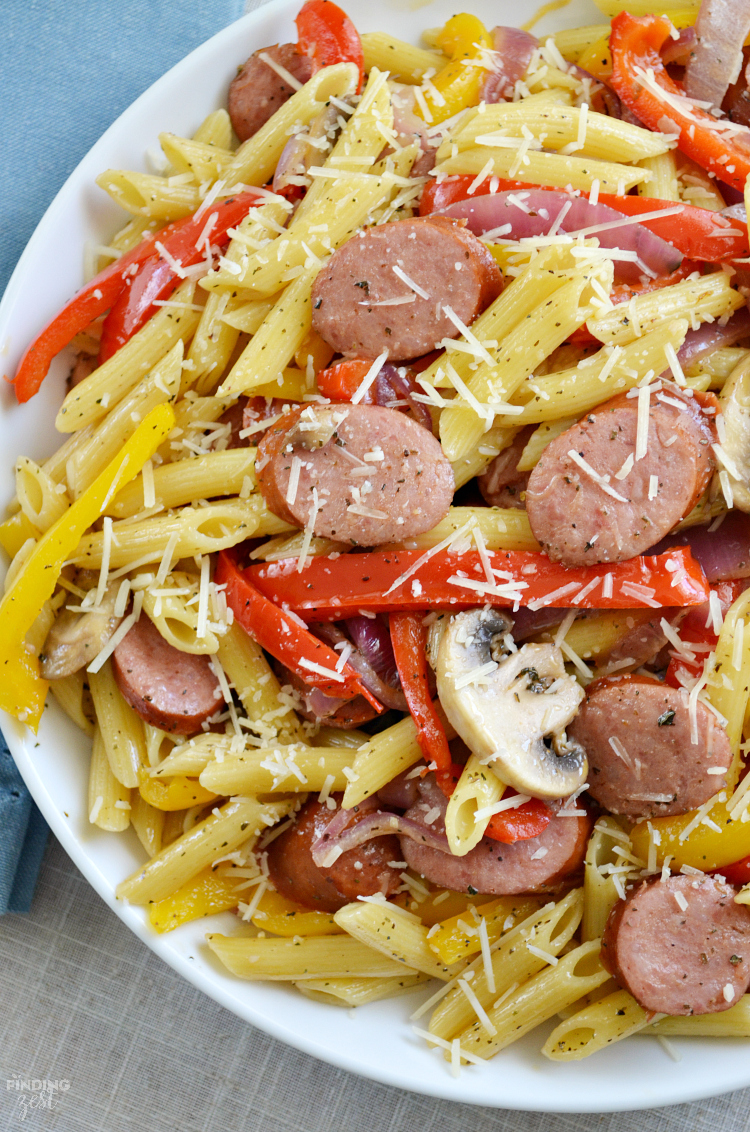 Need a quick dinner recipe? Try this smoked sausage penne pasta recipe that can be on your table in under 30 minutes! Loaded with fresh sauteed vegetables and Parmesan cheese, the whole family will love this meal. Also included are more smoked sausage recipes to try!