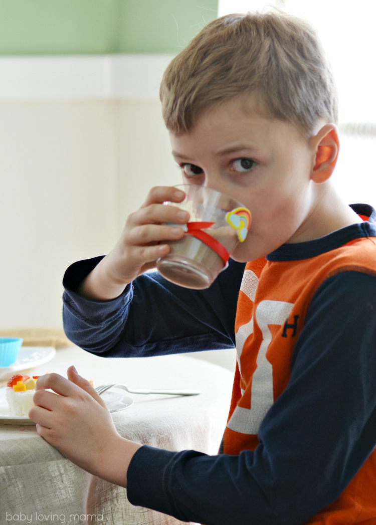 Drinking Chocolate Milk in Rainbow Cup