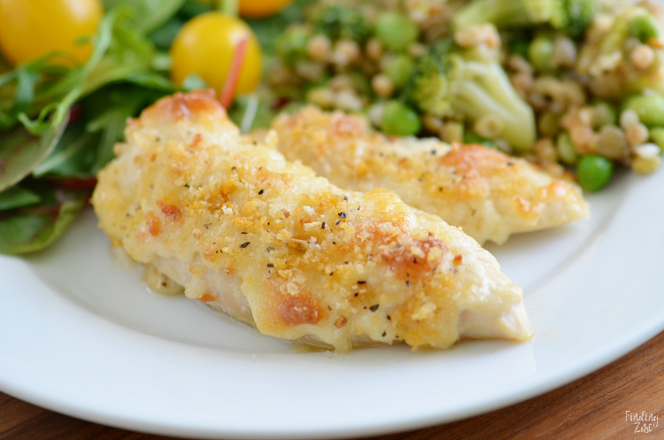 Give these delicious Parmesan Crusted Chicken Tenders a try for your next easy weeknight meal. These homemade chicken tenders have a mild crunchy coating that kids love. The whole family will go nuts for these baked chicken tenders that can be on your table in just 20 minutes!