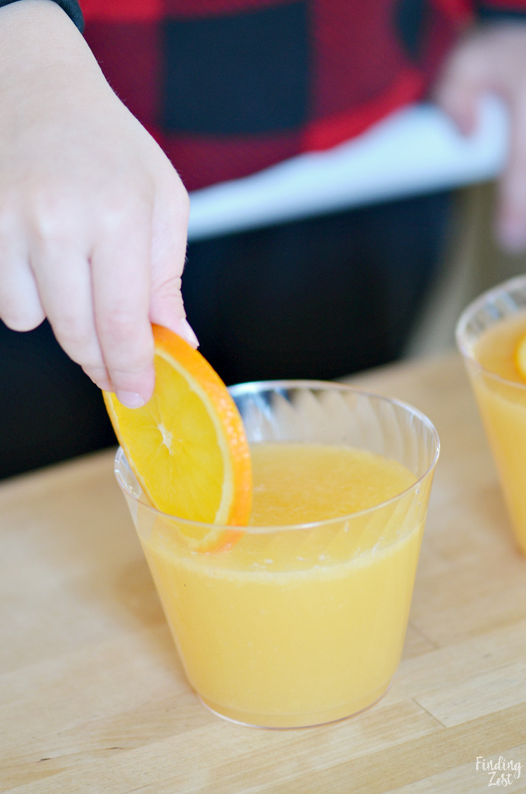 This orange mango punch is a refreshing drink with no added sugar! Make it with mango flavored lemonade, orange juice and sparkling water instead of soda for a healthier party punch. Garnish with fresh orange slices and colorful straws before serving at your next birthday celebration or holiday gathering. Would work especially well for Easter or Mother's Day.