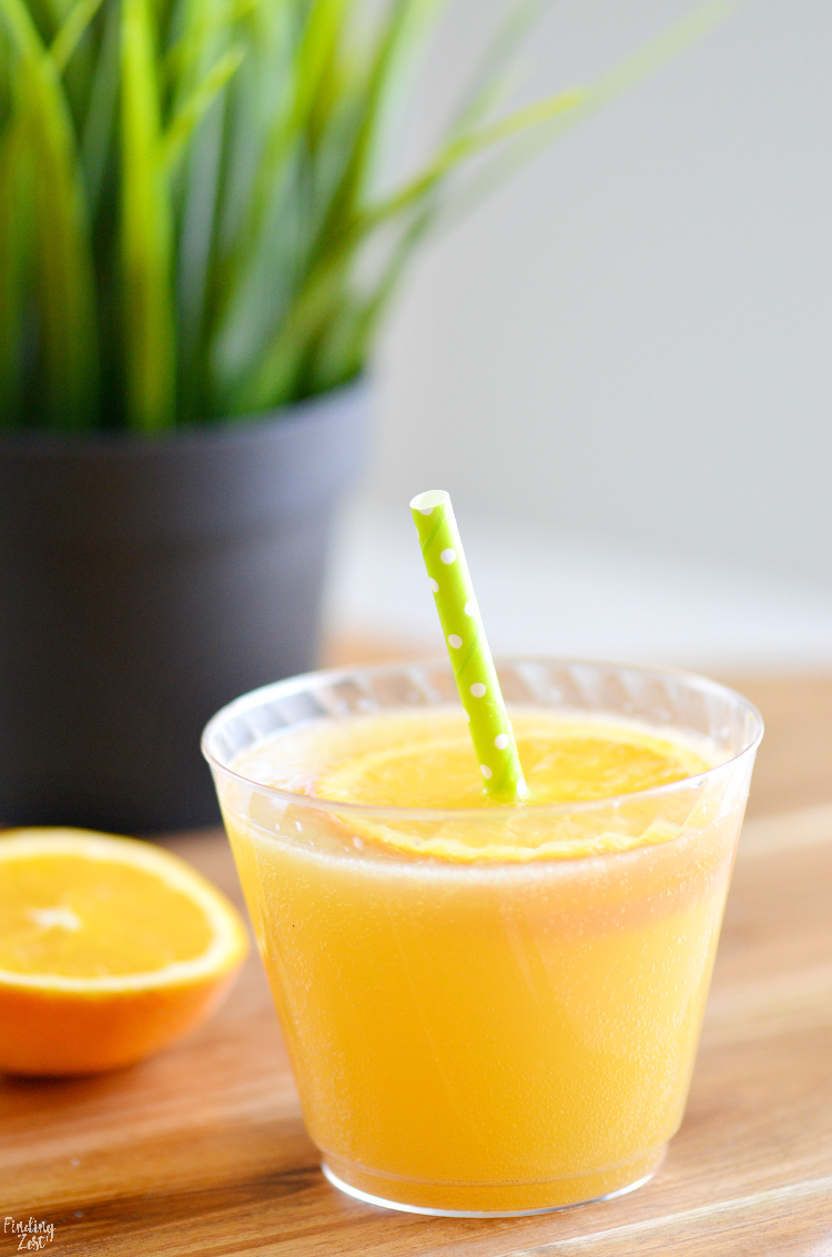 This orange mango punch is a refreshing drink with no added sugar! Make it with mango flavored lemonade, orange juice and sparkling water instead of soda for a healthier party punch. Garnish with fresh orange slices and colorful straws before serving at your next birthday celebration or holiday gathering. Would work especially well for Easter or Mother's Day.