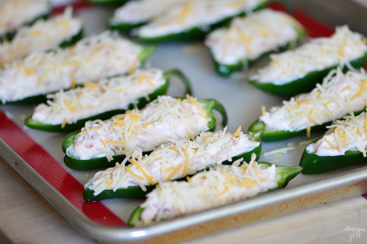 These easy stuffed jalapeno poppers are the perfect spicy game day snack with only five ingredients!