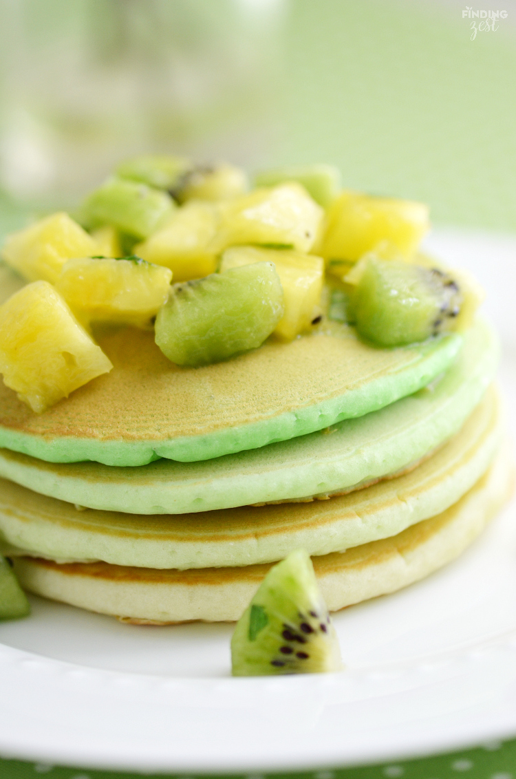 Serve these Green Ombre St. Patrick's Day Pancakes for a delicious breakfast or brunch! Topped with fresh kiwi and pineapple fruit salsa, it is sure to delight.