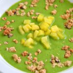 This Shamrock Smoothie Bowl is the perfect green food option for St. Patrick's Day! Kids will love this delicious green smoothie in a bowl or a glass!