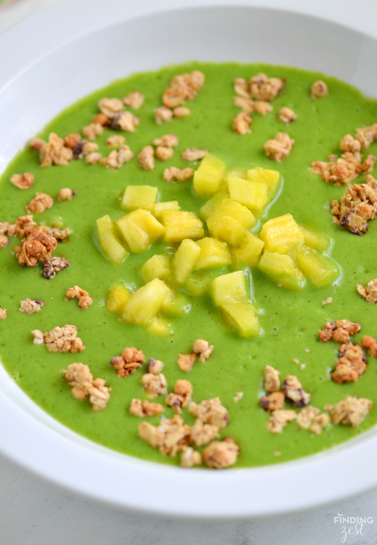 This Shamrock Smoothie Bowl is the perfect green food option for St. Patrick's Day! Kids will love this delicious green smoothie in a bowl or a glass! 