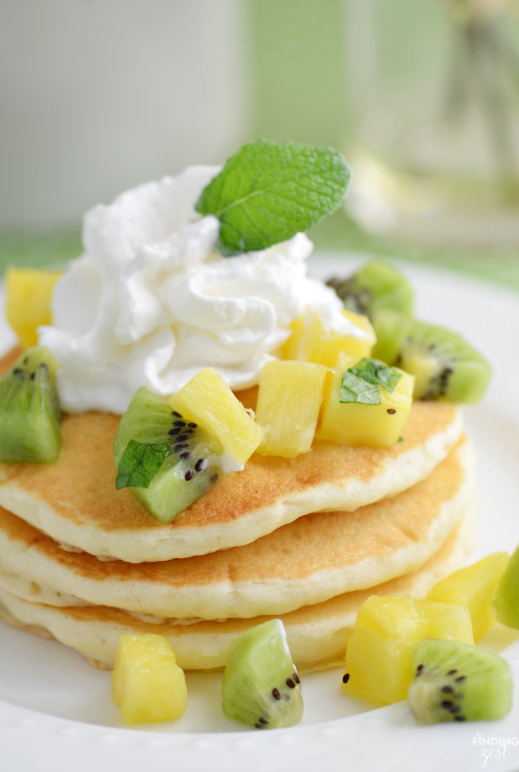 Serve these Green Ombre St. Patrick's Day Pancakes for a delicious breakfast or brunch! Topped with fresh kiwi and pineapple fruit salsa, it is sure to delight.