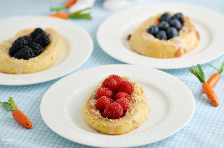 Give these easy Easter Cinnamon Rolls a try for breakfast. You won't believe how simple it is to make bunny and berry filled Easter egg cinnamon rolls! 