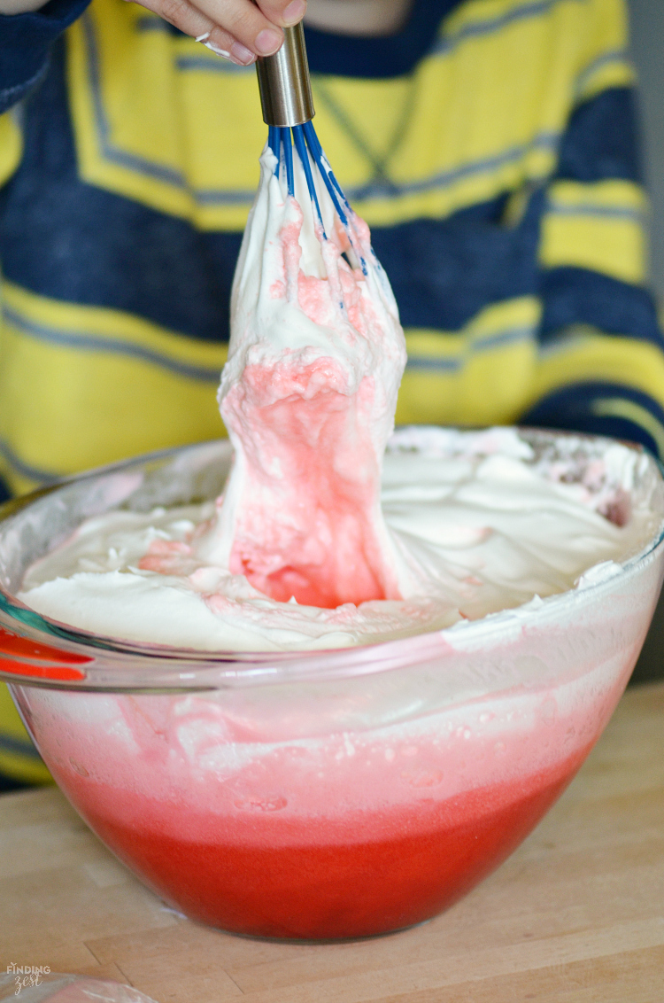 This Strawberry Jello Cake is literally made out of JELL-O! This two layer mock cake is easy and only uses 3 ingredients. No special mold needed! Perfect for those who don't like cake or have food allergies. Make it for your next celebration such as birthdays, Mother's Day, Easter or 4th of July!