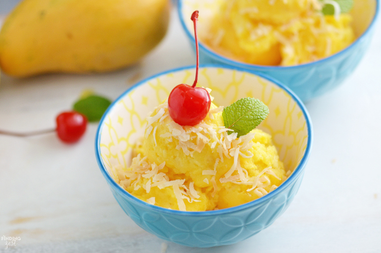Only three ingredients and a blender are needed to make this homemade Mango Pineapple Sorbet! Add toasted coconut & a cherry for a tropical dessert! Kids will love this healthier alternative to ice cream.