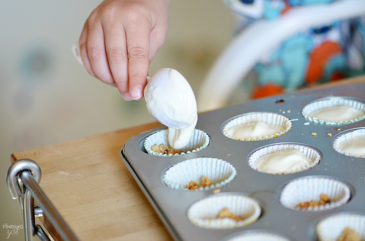 Only three ingredients are needed to make these Chocolate Chip Frozen Yogurt Bites! Kids will love this fun and easy snack.