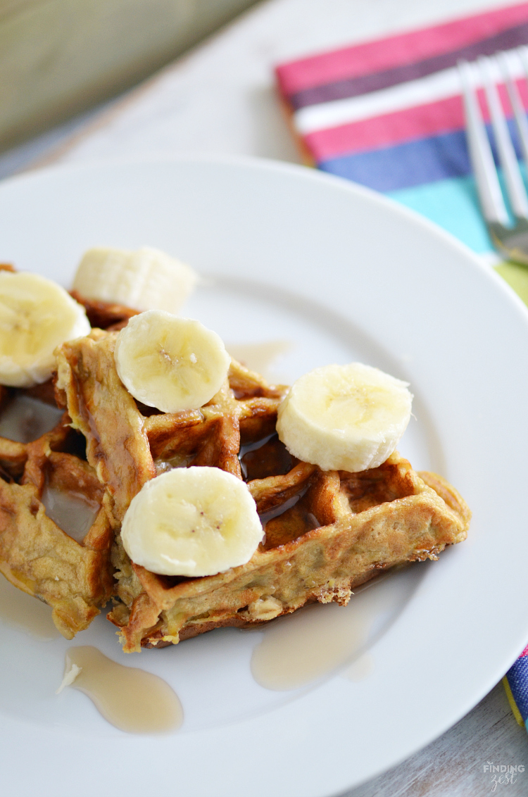 These gluten free banana waffles are loaded with overripe bananas, eggs, oats, and peanut butter. Added sugar optional. Perfect breakfast for those with gluten allergies!