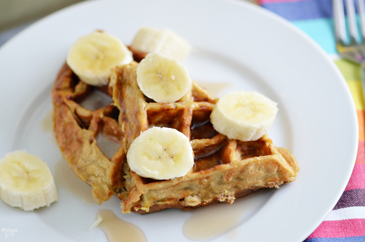 These gluten free banana waffles are loaded with overripe bananas, eggs, oats, and peanut butter. Added sugar optional. Perfect breakfast for those with gluten allergies!