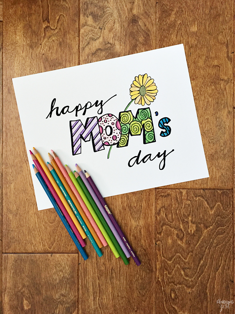 Celebrate mom on Mother's Day with this Happy Mom's Day Coloring Page. Download this free printable for kids or adult coloring!