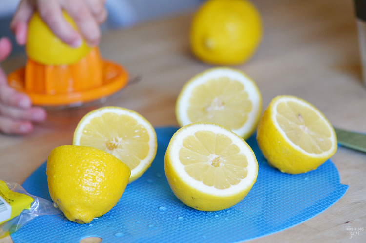 Beat the summer heat with this refreshing Homemade Frozen Lemonade recipe! Made with fresh lemons, this frothy drink is simple and delicious! Make this kid friendly drink at your next celebration.