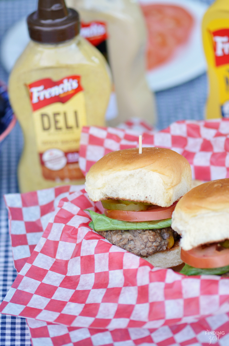 Enjoy melted cheese in the center of your hamburger patty with this delicious mini Juicy Lucy sliders recipe. Don't forget the mustard!