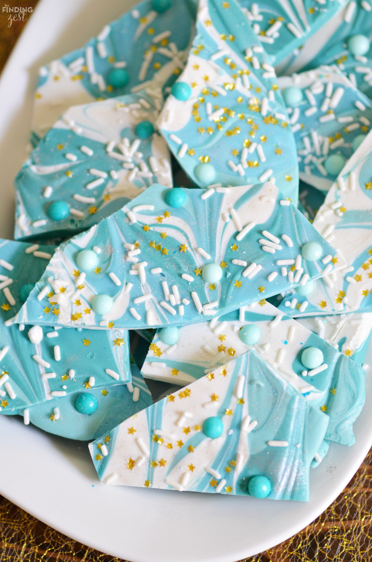 Makes some waves with this mermaid party bark! Swirl chocolate to resemble ocean waves then top with sprinkles, gold stars and silver dust! Perfect for any ocean party celebrations. Kids will love it!