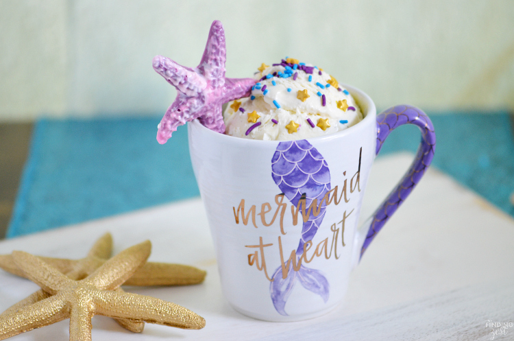 This mermaid confetti mug cake makes it easy to have a single serving of delicious cake anytime with just a few ingredients and a microwave! Topped with vanilla ice cream, chocolate starfish and sprinkles, this mermaid mug cake is perfect for mermaid fans any day or as special birthday treat!