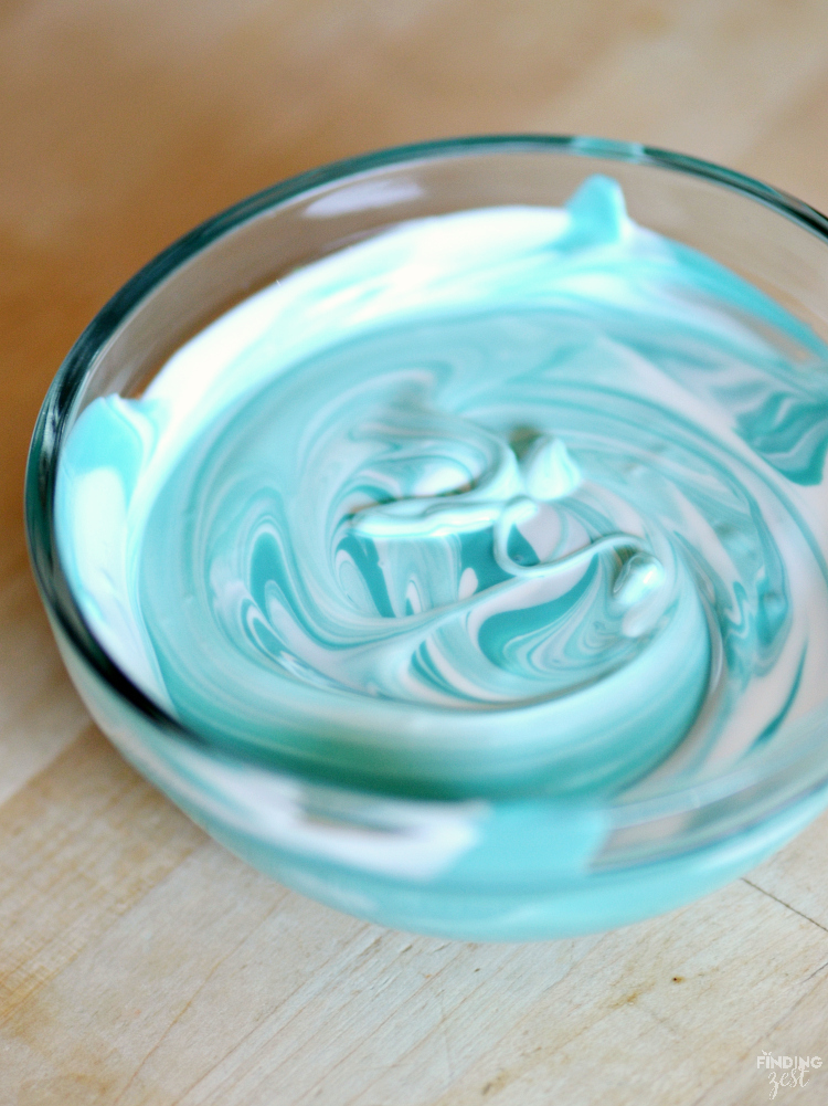 Kick dessert up a notch with these sparkling mermaid ice cream cones! Kids will love these chocolate dipped cones. Perfect for a mermaid or frozen themed birthday party!
