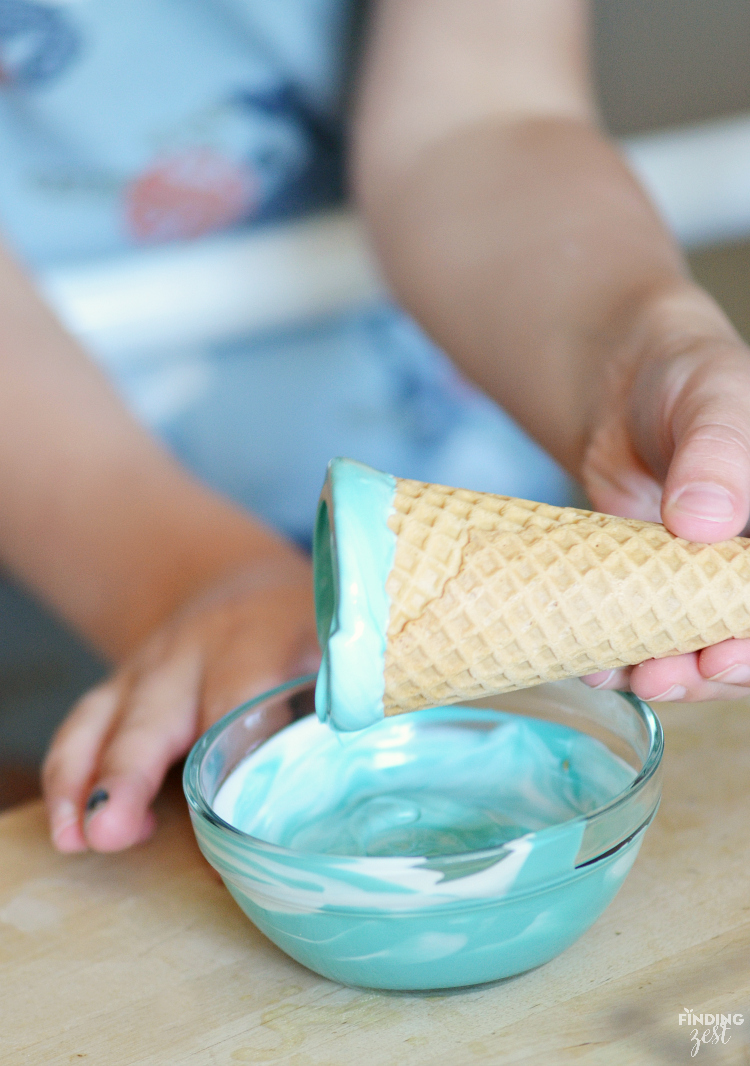 Kick dessert up a notch with these sparkling mermaid ice cream cones! Kids will love these chocolate dipped cones. Perfect for a mermaid or frozen themed birthday party!