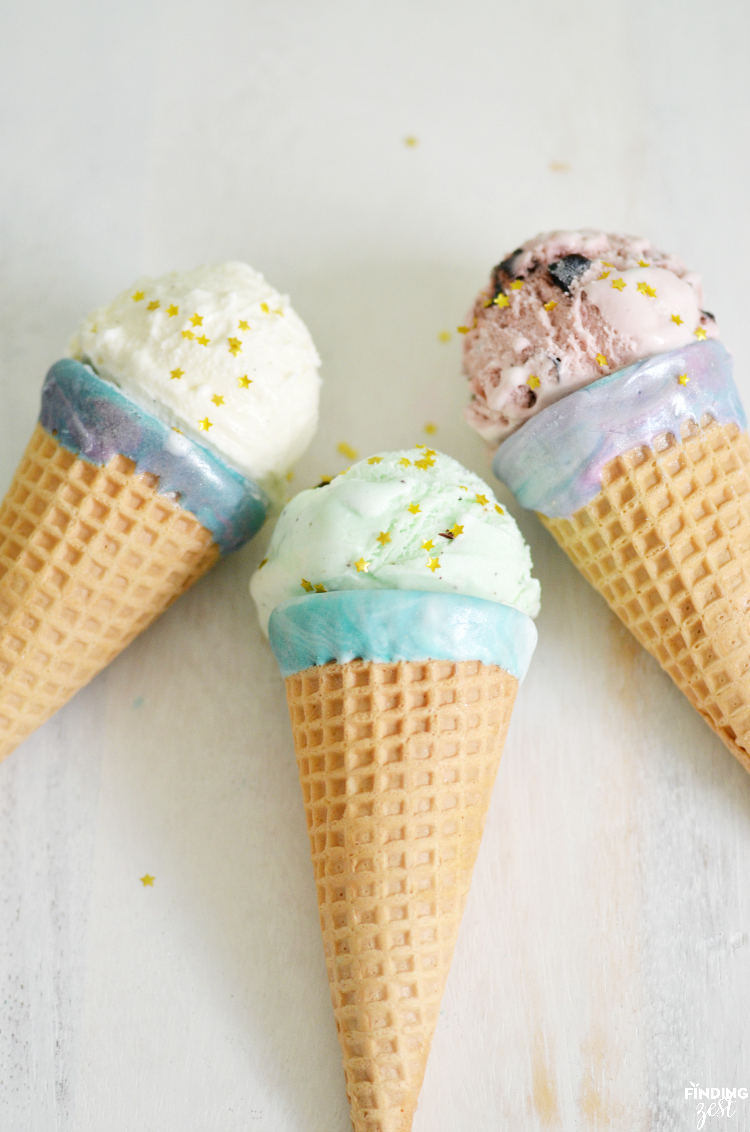 Kick dessert up a notch with these sparkling mermaid ice cream cones! Kids will love these chocolate dipped cones. Perfect for a mermaid or frozen themed birthday party!
