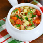 Enjoy this Easy Slow Cooker Minestrone Soup loaded with ham, vegetables and pasta any time you need a hearty meal to warm you up this winter!