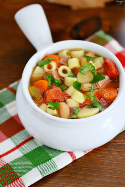 Enjoy this Easy Slow Cooker Minestrone Soup loaded with ham, vegetables and pasta any time you need a hearty meal to warm you up this winter!