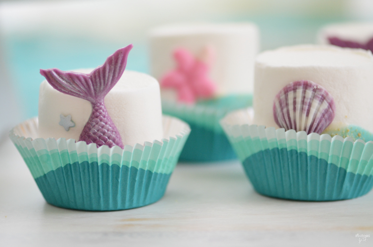 If you are searching for under the sea party ideas, look no further than these mermaid tail marshmallows! This no-bake treat features colorful chocolate mermaid tails and swirled chocolate waves. It is the perfect addition to any mermaid party or under the sea birthday themes!