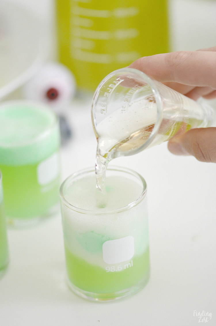 Kids will love this Mad Scientist Green Punch recipe which foams up naturally. Let your punch be the centerpiece of your mad scientist birthday party or Halloween party. Turn your drink into a science experiment and let kids make their own using syringes and beakers!