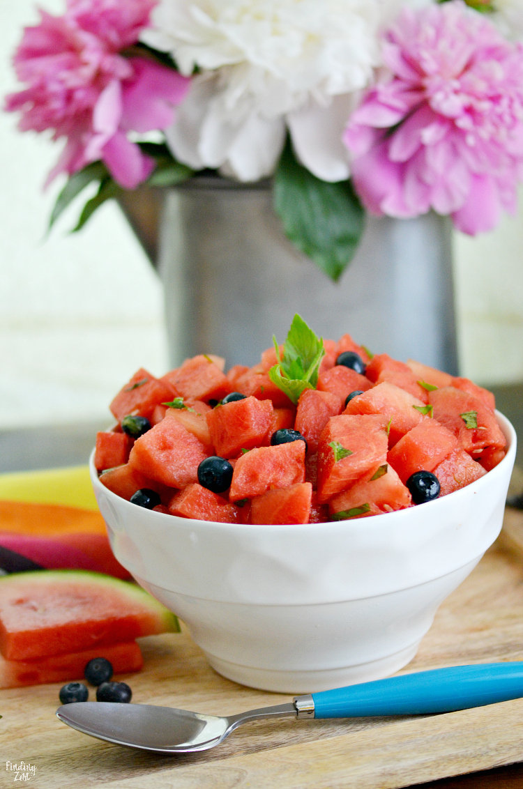 Get a taste of summer exploding in your mouth with this refreshing watermelon mint salad including blueberries and feta! Don't like feta? Feel free to skip it as this balsamic fruit salad recipe is amazing with or without cheese!
