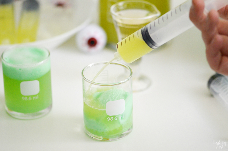 Kids will love this Mad Scientist Green Punch recipe which foams up naturally. Let your punch be the centerpiece of your mad scientist birthday party or Halloween party. Turn your drink into a science experiment and let kids make their own using syringes and beakers!