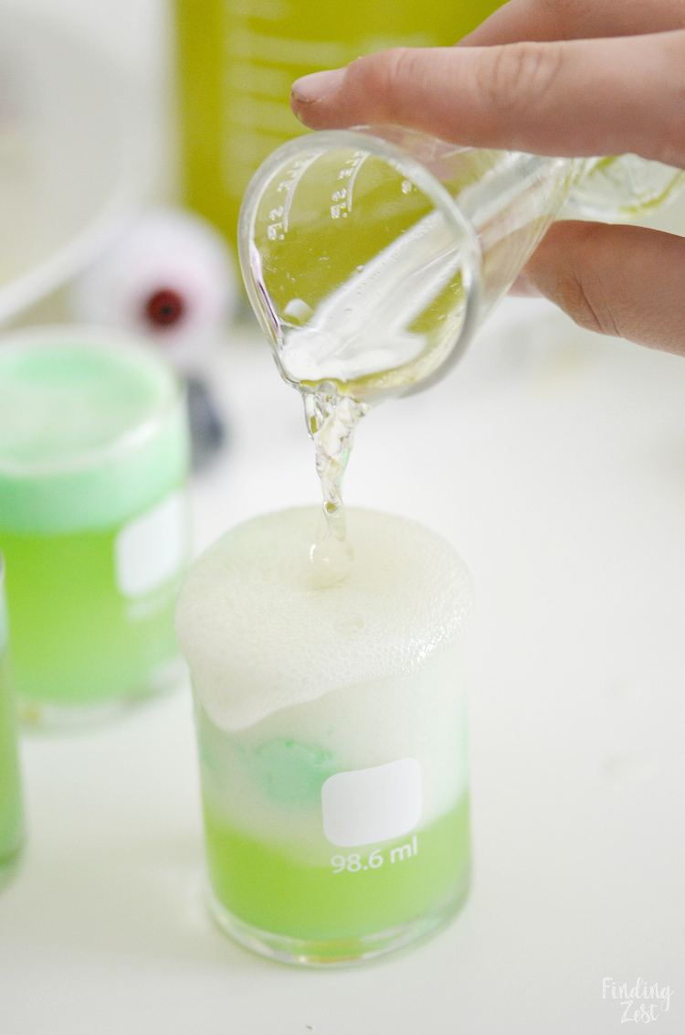 Kids will love this Mad Scientist Green Punch recipe which foams up naturally. Let your punch be the centerpiece of your mad scientist birthday party or Halloween party. Turn your drink into a science experiment and let kids make their own using syringes and beakers!