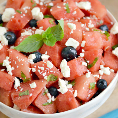 Get a taste of summer exploding in your mouth with this refreshing watermelon mint salad including blueberries and feta! Don't like feta? Feel free to skip it as this balsamic fruit salad recipe is amazing with or without cheese!