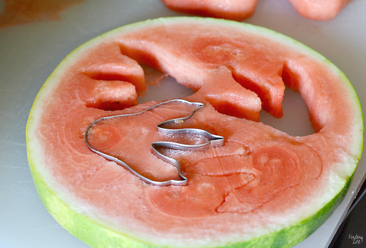 Celebrate the back to school season with this easy dinosaur snack idea with dinosaur footprints! Kids will love these fun dino fruit skewers with yogurt fruit dip inspired by We Don't Eat Our Classmates, a humorous children's book by Ryan T Higgins. 