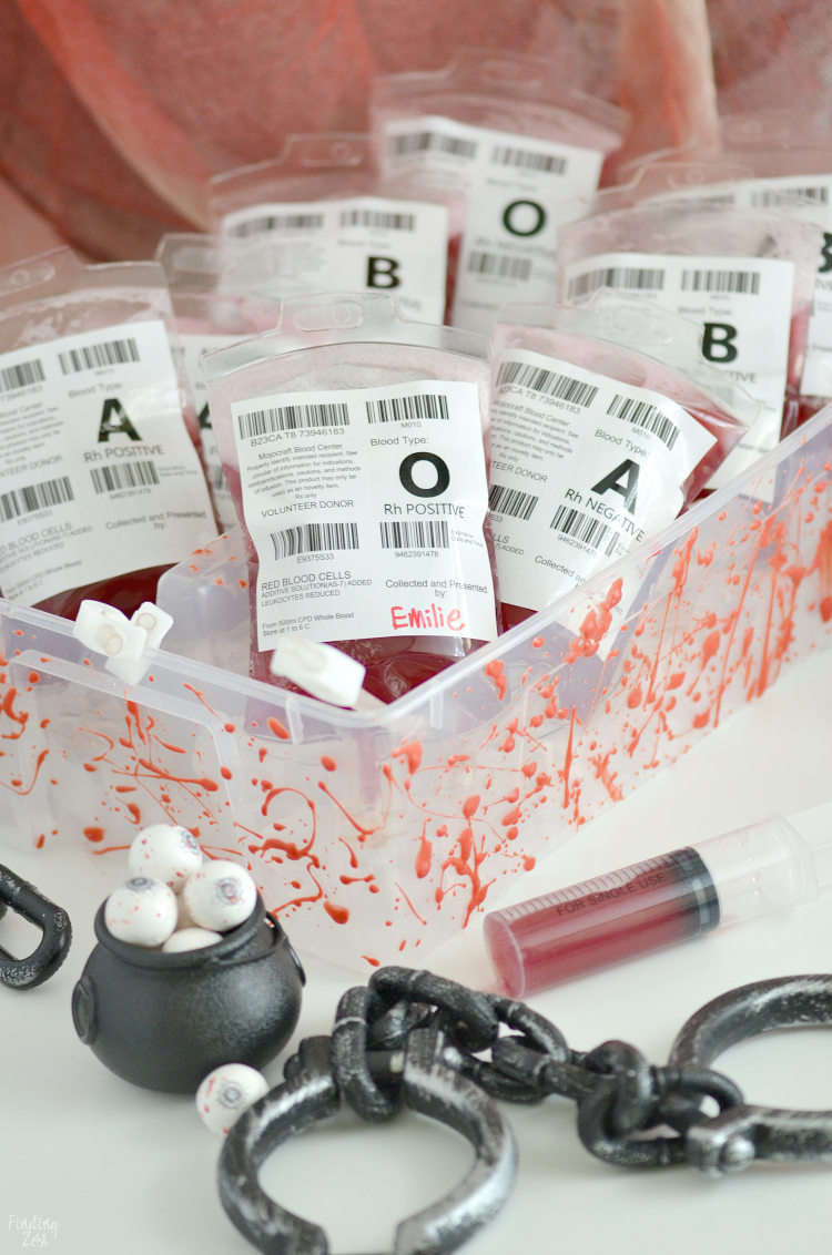 Entertain guests at your Halloween party with these fun blood bags! This red Halloween Drink (non-alcoholic) is perfect for filling fake I.V. bags designed specifically for drinks. Learn tips for how to fill and clip the bags and how to make the easiest edible fake blood splatters! This is also a great accessory to your vampire costume!