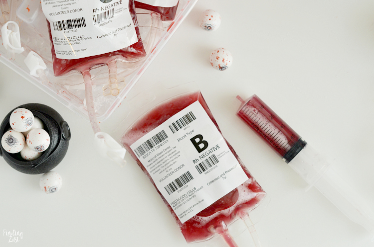 Entertain guests at your Halloween party with these fun blood bags! This red Halloween Drink (non-alcoholic) is perfect for filling fake I.V. bags designed specifically for drinks. Learn tips for how to fill and clip the bags and how to make the easiest edible fake blood splatters! This is also a great accessory to your vampire costume!