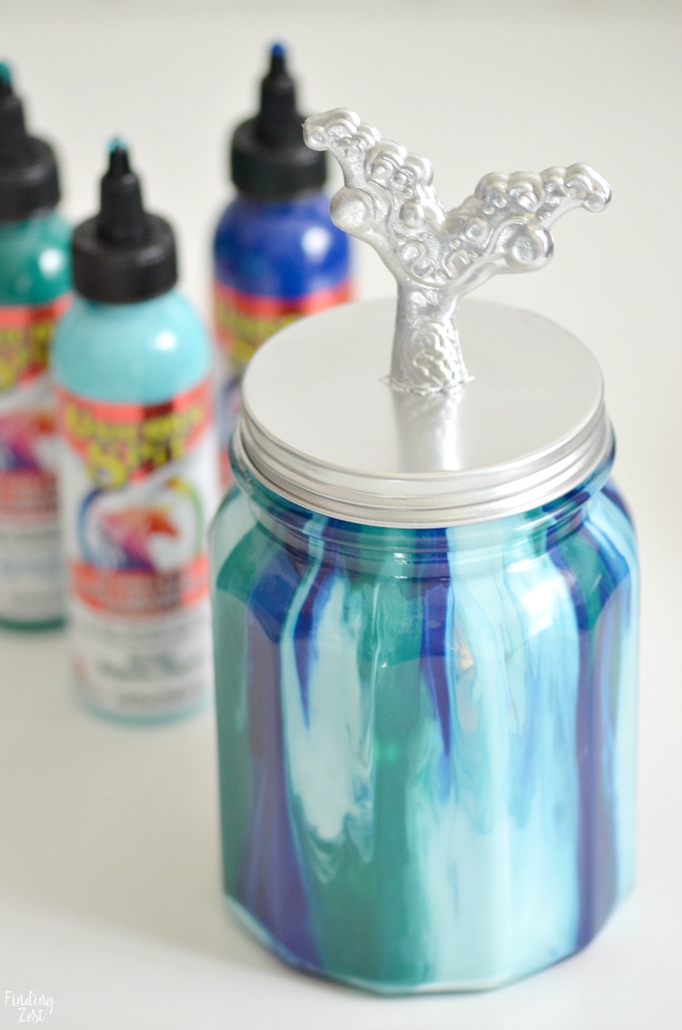 Make this beautiful mermaid jar light using dollar store products and Unicorn Spit! Super fun and easy mermaid craft!