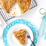 This rhubarb pie with crumble topping is an amazing spring dessert. The sweetened rhubarb is not tart once baked and the brown sugar and oatmeal topping is a perfect pairing. Serve this easy rhubarb pie warm or cold with a scoop of vanilla ice cream for an irresistible treat!