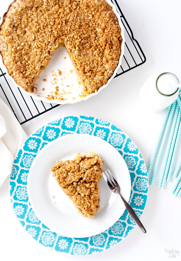 This rhubarb pie with crumble topping is an amazing spring dessert. The sweetened rhubarb is not tart once baked and the brown sugar and oatmeal topping is a perfect pairing. Serve this easy rhubarb pie warm or cold with a scoop of vanilla ice cream for an irresistible treat!