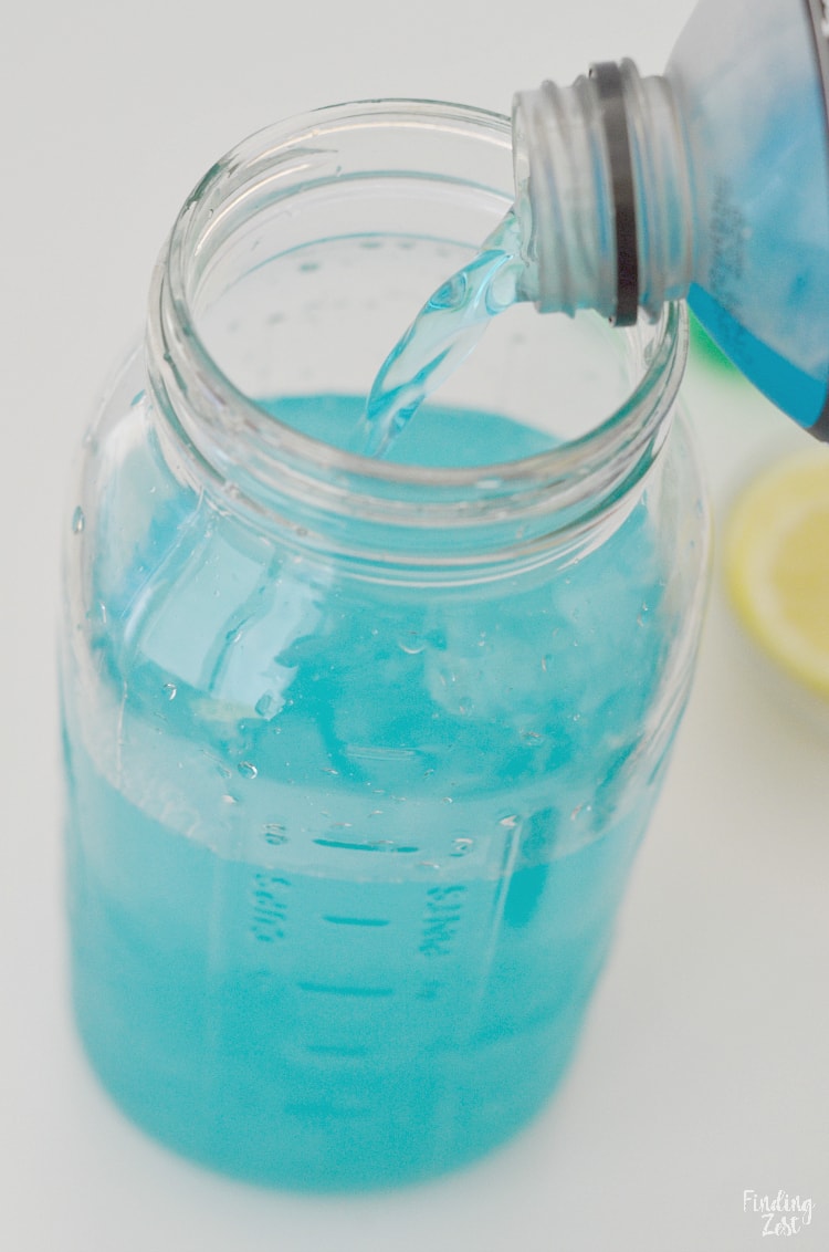 Adding blue sports drink to lemonade