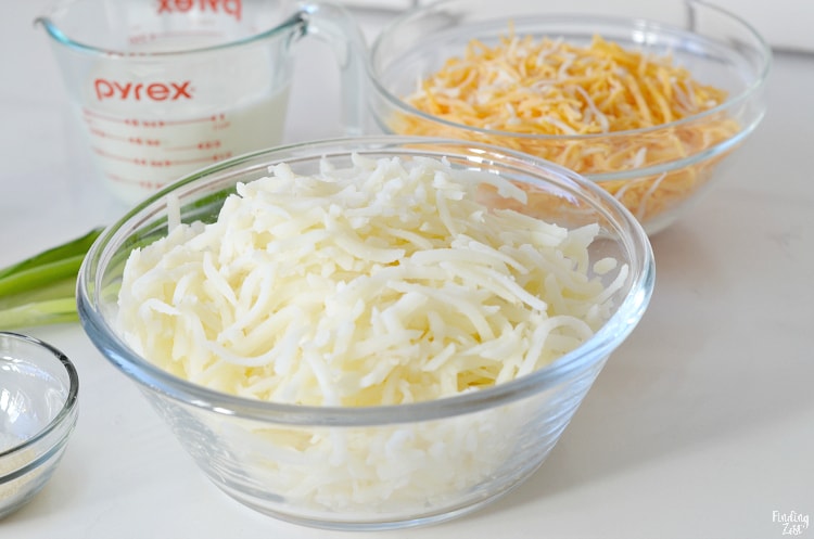 Fresh shredded hash browns in a bowl for egg bake