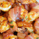 Shrimp and bacon are a killer combination. Give this bacon wrapped shrimp appetizer a try in your air fryer for easy prep! No air fryer? No problem! Baking instructions are also included!