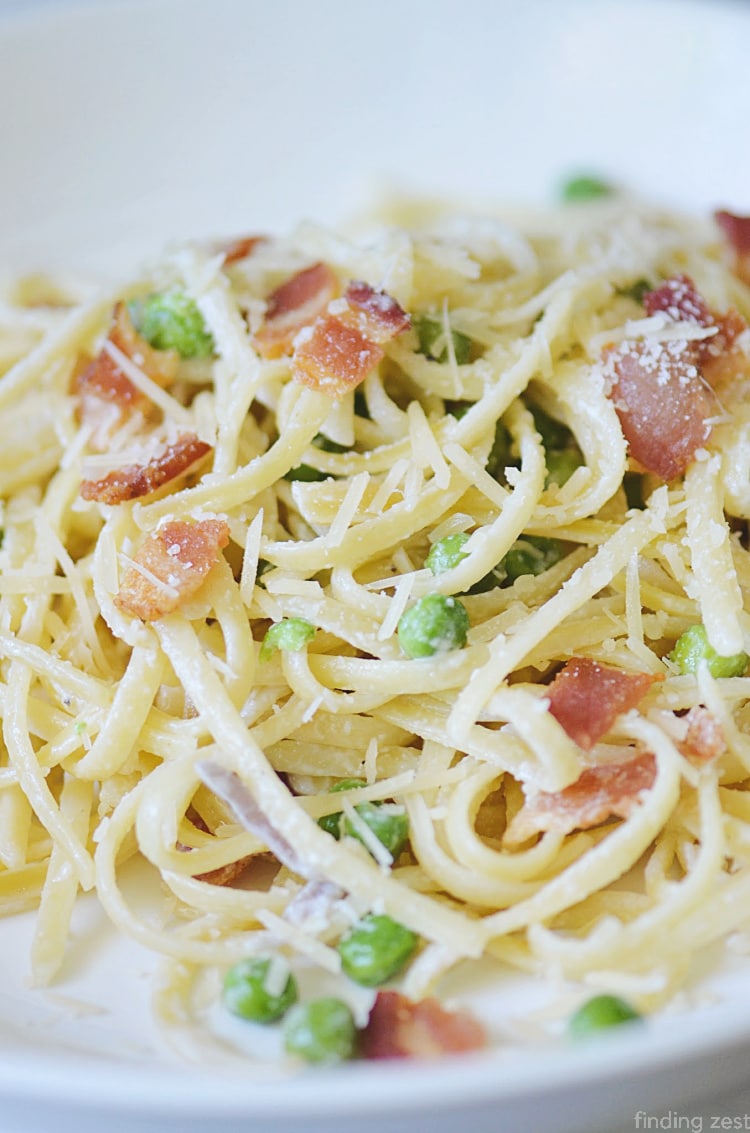 Pasta with peas and bacon is a great dinner recipe! This simple pasta dish is sure to become a favorite!