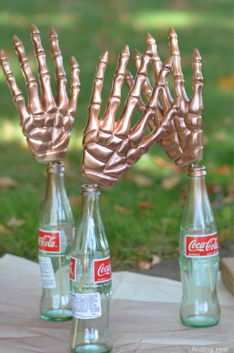 How to spray paint plastic skeleteon hands from the dollar store a metallic copper color