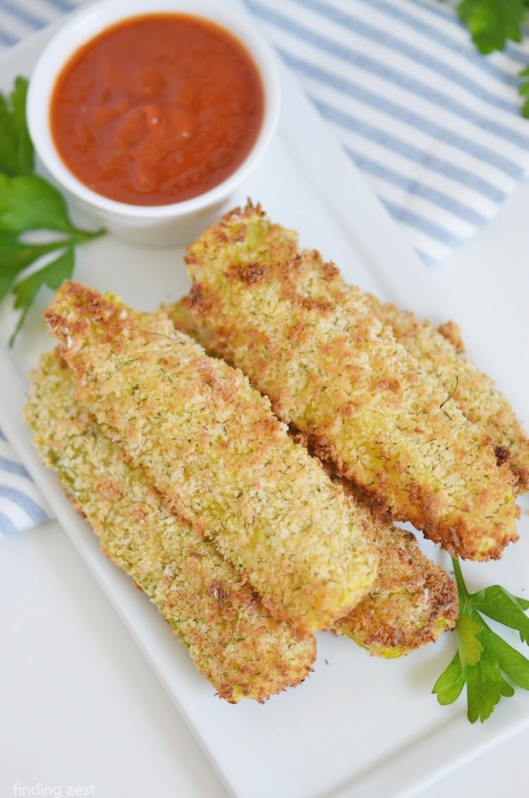 Air Fryer Pickles are the appetizer or game day snack you didn't know you were missing! Calling all pickle lovers, these crispy pickle spears are great for dipping in your favorite sauces including marinara or ranch dressing. Give them a try!