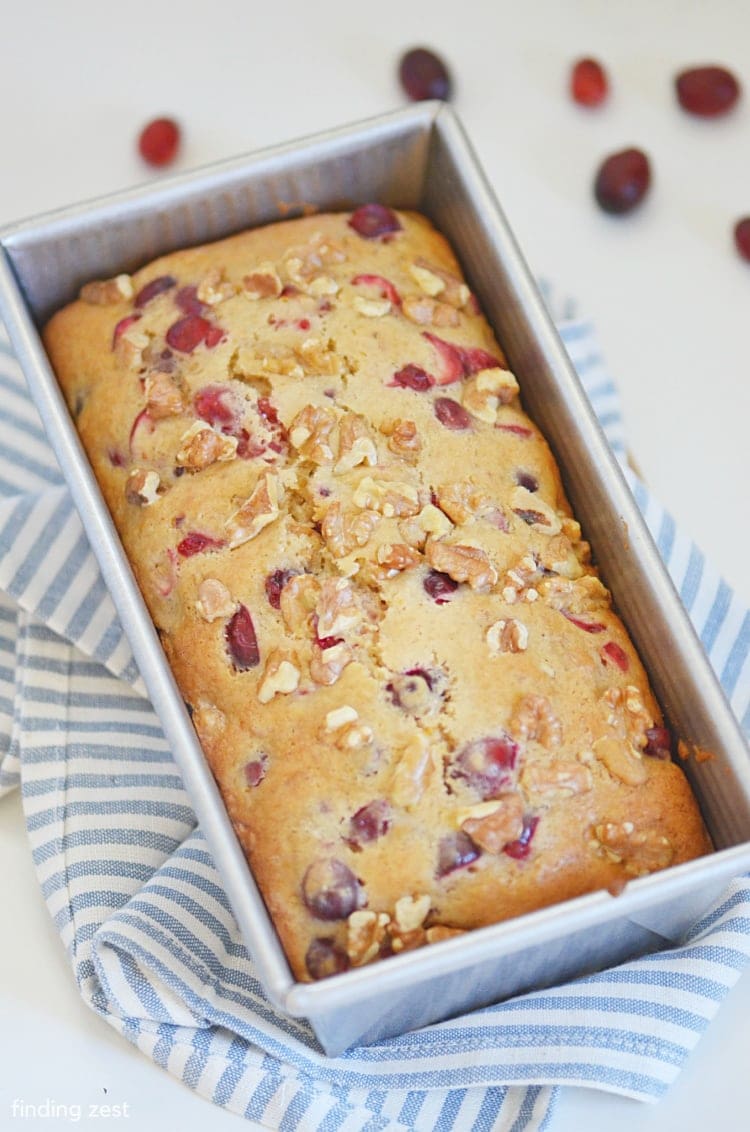 Cranberry Walnut Bread is a tasty combination of flavors you won't be able to resist! Serve guests during the holidays a hearty and flavorful bread that will have them coming back for seconds.  This bread is easy to whip up in no time! 