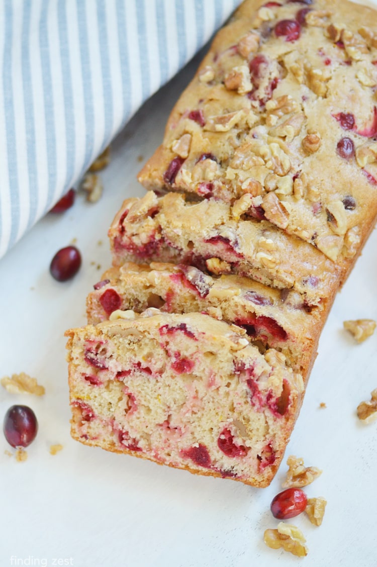 Cranberry and Walnut Bread is a delicious quick bread recipe, perfect for the holidays! Serve it up for your holiday brunch or any time of day. Tastes amazing with a cup of coffee or tea!